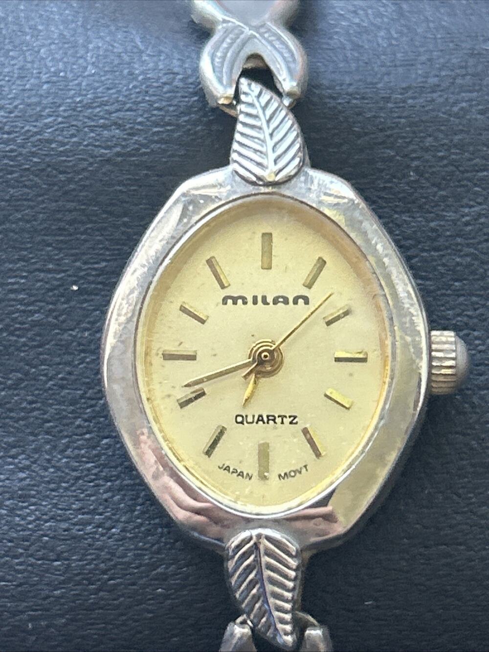 Milan Silver Tone Case Gold Tone Dial Women’s Stretch Band Quartz Watch